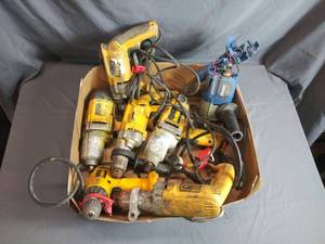 lot 99 image: Box of Repairable Drills and Impacts