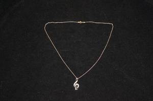 lot 124 image: Sterling Silver Music Note Pendant with Chain