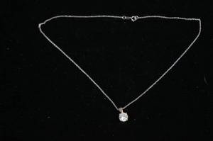 lot 128 image: Sterling Silver Clear Stone Pendant with Chain