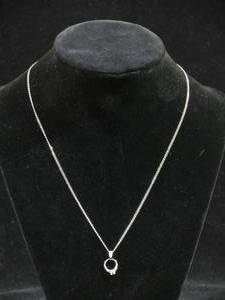 lot 134 image: Baby Ring with Sterling Silver Chain
