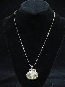 lot 149 image: Sterling Silver Mother of Pearl Pendant with Chain