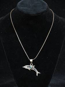 lot 153 image: Sterling Silver Chain with Dolphin Pendant