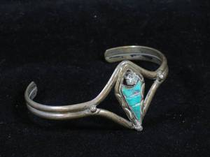 lot 186 image: Sterling Silver Cuff Bracelet with Turquoise Accents