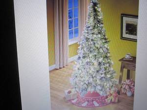 lot 25 image: 7 ft Flocked Tree open box Retail $...
