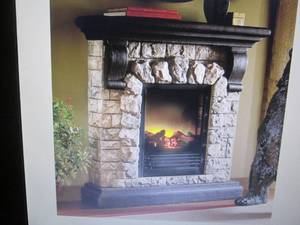 lot 30 image: Faux Stone Fireplace open box Retai...