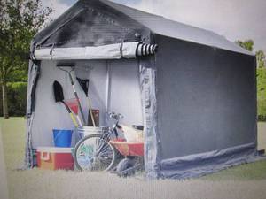 lot 35 image: Garage Storage Tent open box Retail...
