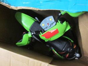 lot 84 image: Ride on Motorcycle Green open box r...