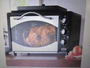 lot 96 image: Ginnys 10-In-1 Everything Oven ope...