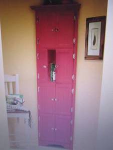 lot 101 image: 8-Door Corner Cabinet open box Reta...