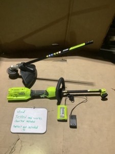 lot 39 image: RYOBI 40-Volt LiTHIUM-ION CORDLES ATTACHMENT CAPABLE STRING TRIMMER WITH CHARGER INCLUDED BUT NO BATTERY