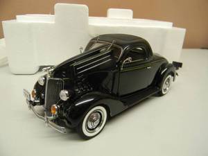 lot 39 image: THE DANBURY MINT 1936 FORD DELUXE COUPE - 124 SCALE - NEW IN BOX EXCELLENT CONDITION - GREAT PIECE - SEE PICTURES