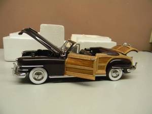 lot 42 image: THE DANBURY MINT 1948 CHRYSLER TOWN & COUNTRY - 124 SCALE - NEW IN BOX EXCELLENT CONDITION - GREAT PIECE - SEE PICTURES