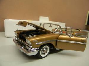 lot 43 image: THE DANBURY MINT ANNIVERSARY GOLD METALIC 1958 CHEVY IMPALA - 124 SCALE - NEW IN BOX EXCELLENT CONDITION - GREAT PIECE - SEE PICTURES