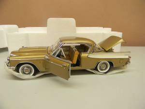 lot 46 image: THE DANBURY MINT 1957 STUDEBAKER GOLDEN HAWK - 124 SCALE - NEW IN BOX EXCELLENT CONDITION - GREAT PIECE - SEE PICTURES