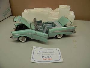 lot 58 image: THE DANBURY MINT 1957 CHEVROLET BEL AIR SURF GREEN - 124 SCALE - NEW IN BOX EXCELLENT CONDITION - GREAT PIECE - SEE PICTURES