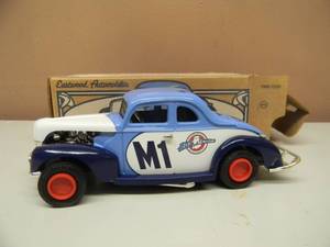 lot 64 image: EASTWOOD AUTOMOBILIA ERTL COLLECTIBLES - 1940 FORD MODIFIED COUPE - NEW IN BOX - SEE PICTURES