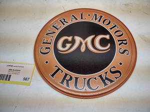 lot 567 image: GMC Trucks Tin Sign, 12...