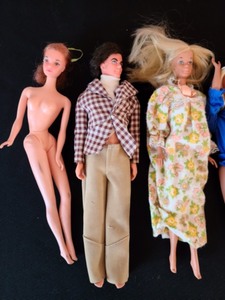 lot 113 image: Vintage Barbies and Clothing