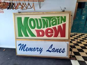 lot 17 image: Vintage Mountain Dew Outdoor 2-Sided Sign