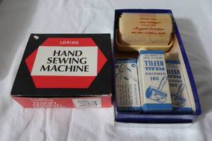 lot 6 image: 2 Small Vintage Hand Tools - Lint RollerHand Sewing Machine