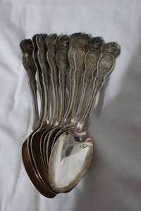 lot 21 image: 9 Silverplate US State Spoons