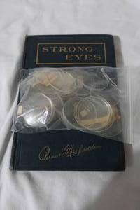 lot 33 image: Vintage Eye Health Book & Lenses