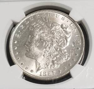lot 24 image: 1887 MORGAN SILVER DOLLAR MS61 NGC