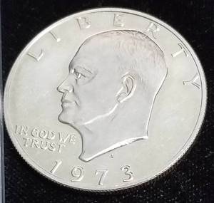 lot 26 image: 3 US COINS 1973-S PROOF IKE $1 1935 BUFFALO 5C 1943 WWII STEEL CENT