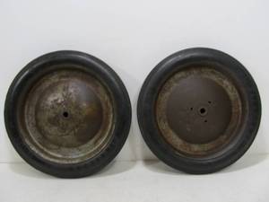 lot 23 image: Pair of Early Vintage Solid Rubber Wheels