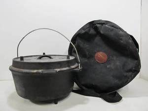 lot 108 image: Large Camp Chef Lewis & Clark Cast Iron Dutch Oven wCase