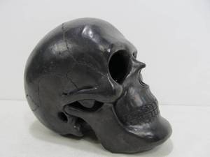 lot 226 image: Black Ceramic Life-Size Human Skull