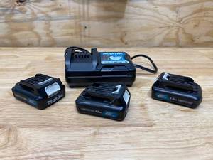 lot 21 image: MAKITA 12v Battery Charger with 3 Batteries