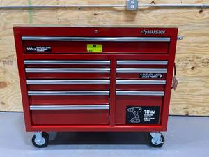 lot 42 image: HUSKY 42 in. W x 18.1 in. D 10-Drawer Mobile Workbench with Solid Wood Top in Red