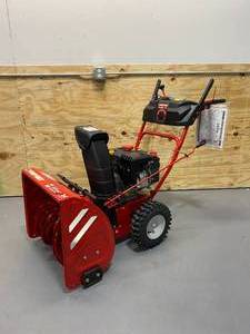 lot 51 image: TROY-BILT Storm 2410 24-in 208-cc Two-Stage Self-Propelled Gas Snow Blower with Push-Button Electric Start