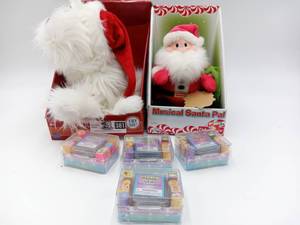 lot 381 image: Musical Santa, Musical Puppy Santa & 4 stamp Sets