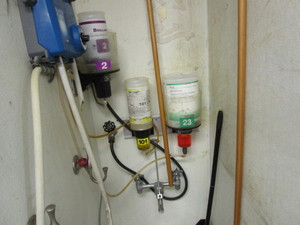 lot 61 image: Large Lot of Cleaning Supplies & Rack