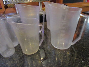 lot 142 image: Water Pitchers & Measuring Pitchers