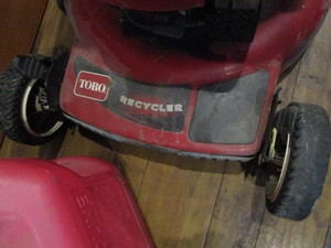 lot 218 image: Toro Mower & Gas Jug