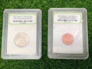 lot 47 image: Lot of 2 Uncirculated Penny & Quarter