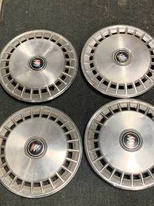 lot 61 image: Lot of 4 Buick Hubcaps