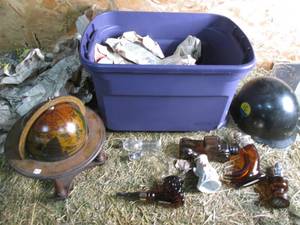 lot 36 image: Tote With Lid of Avon Bottles, Glob...
