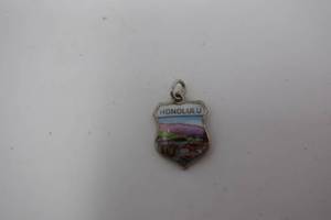 lot 100 image: Vintage Sterling Honolulu Charm