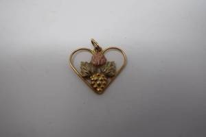lot 120 image: Black Hills Gold Heart Pendant With Grape Leaves