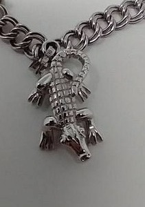 lot 71 image: Sterling Charm Bracelet With Two Charms