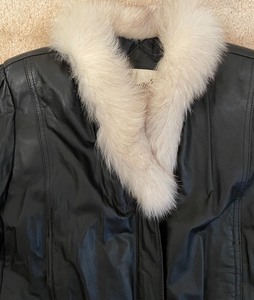 lot 8 image: Bermans Black Leather Coat with a Foxtail Collar