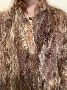 lot 28 image: Bermans Pieced Raccoon Coat