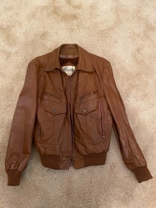 lot 50 image: Bermans Leather Experts Genuine Leather Coat