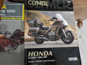 lot 52 image: Honda Manuals...
