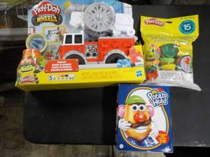lot 110 image: Play Doh and Mr. Potato Head Toys...
