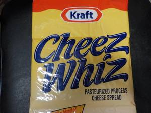 lot 179 image: 6.5 lb. Bag Kraft Cheez Whiz refri...